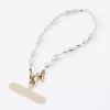 UNIQ Coehl Perla Handschlaufe Universal Phone Lanyard für Handgelenk, Weißperle