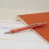 Schneider Epsilon Kugelschreiber Orange mit blauer Tinte 138606