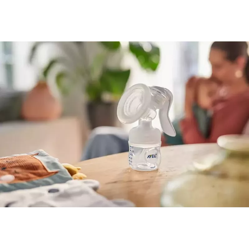 Philips Avent Lotus manuelle Milchpumpe mit 3 Aufbewahrungsbechern und Adapter