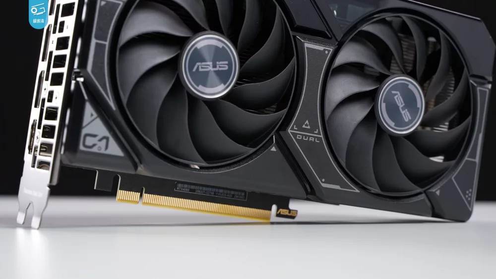 Dual fan graphics card on a white desk